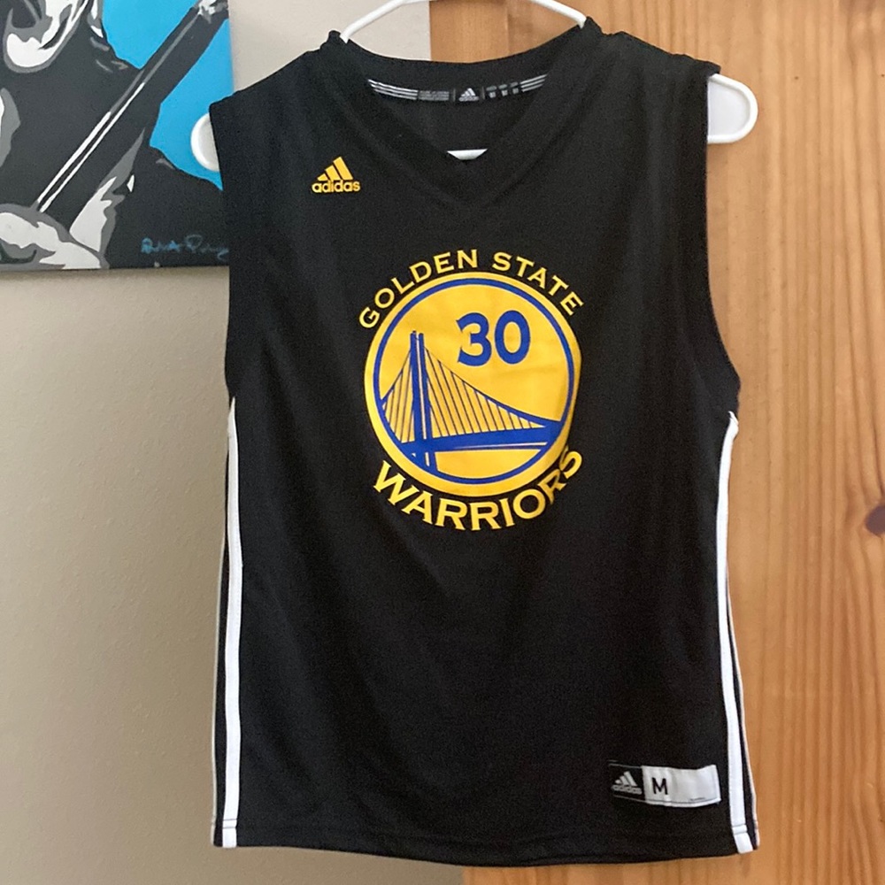 Worn once. Medium woman’s adidas jersey